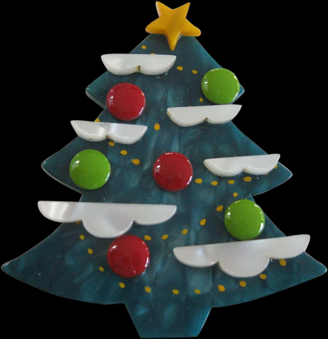 A Blue Christmas Tree With White And Red Circles And White Stars