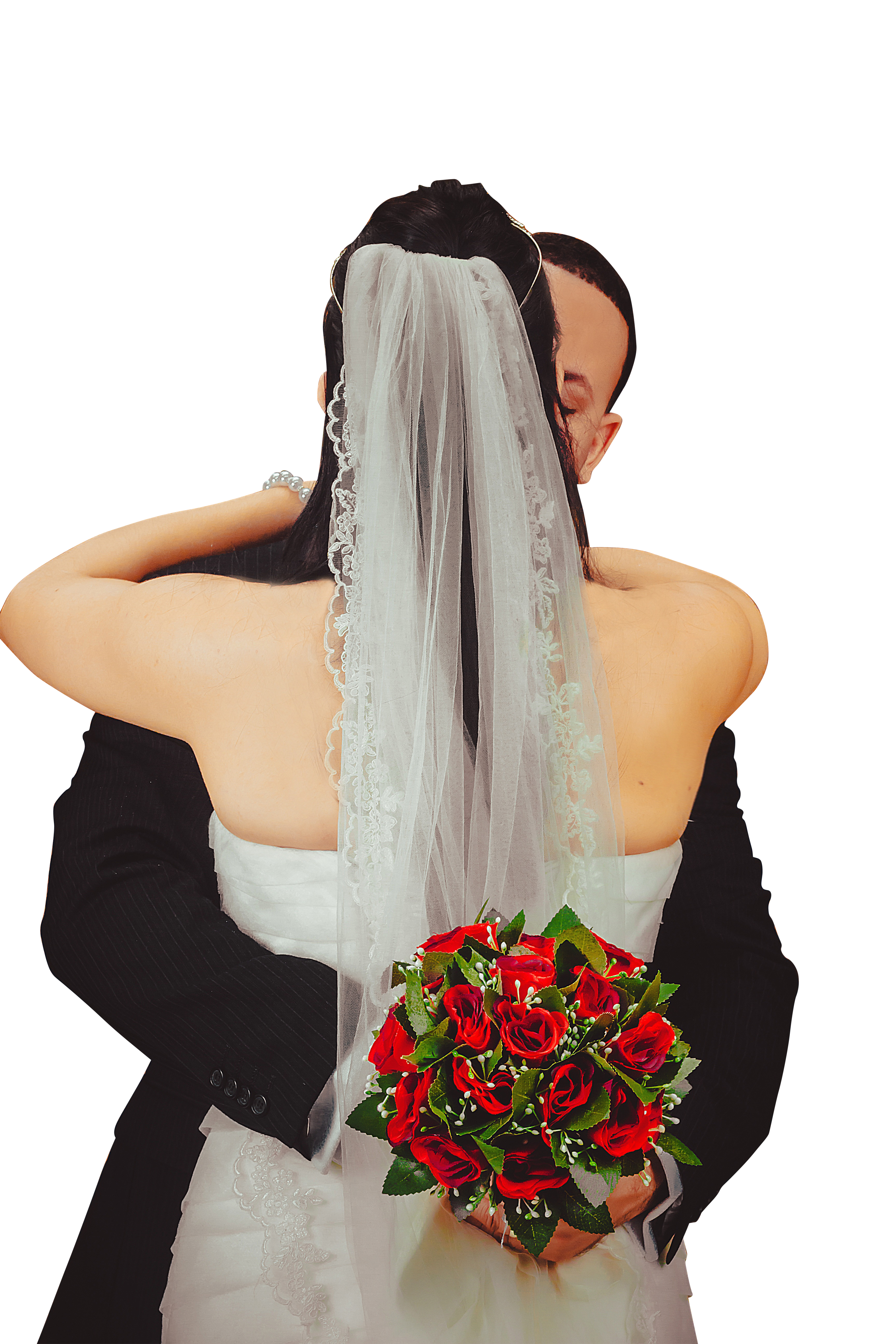 A Bride And Groom Hugging