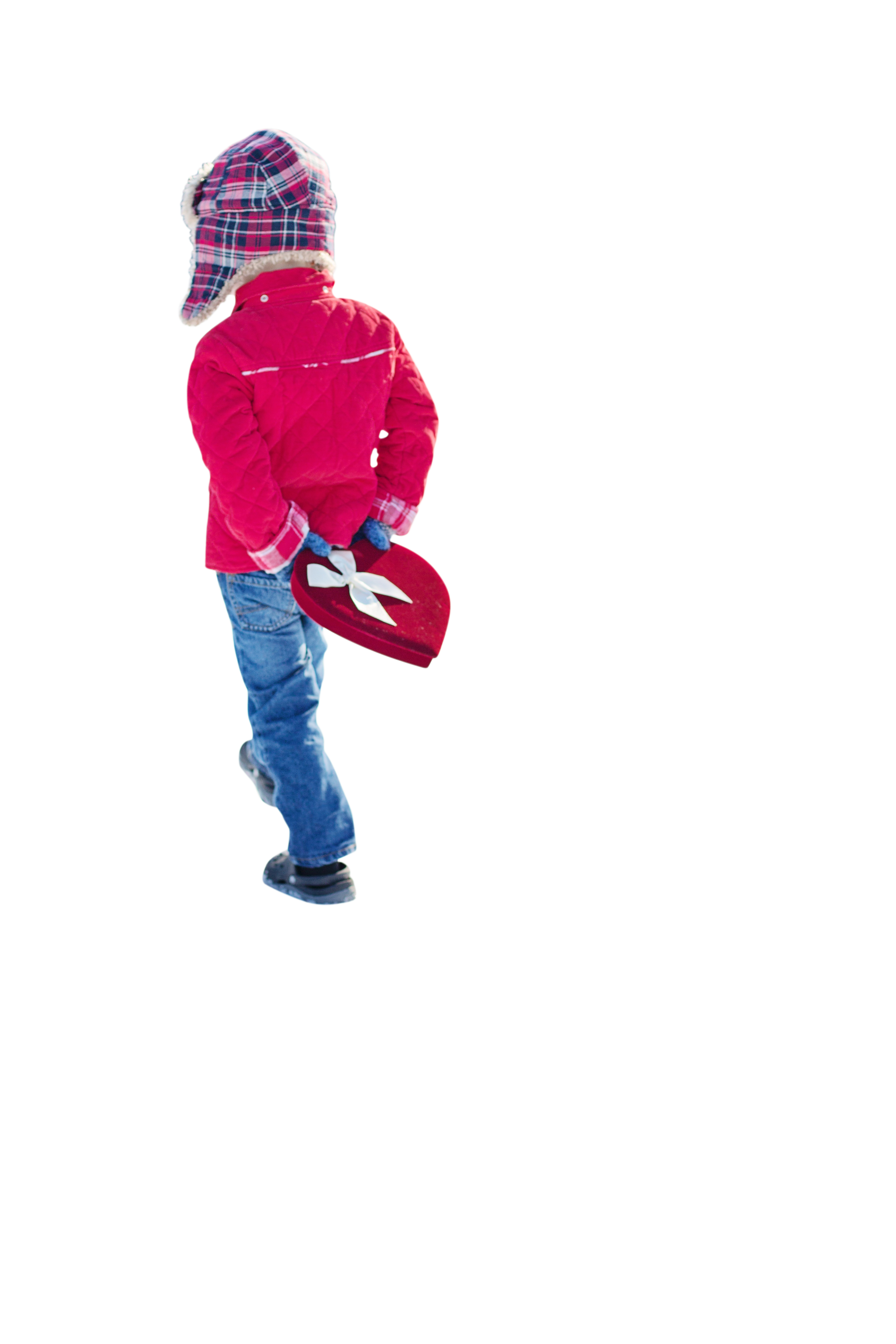 A Child Carrying A Heart Shaped Box PNG
