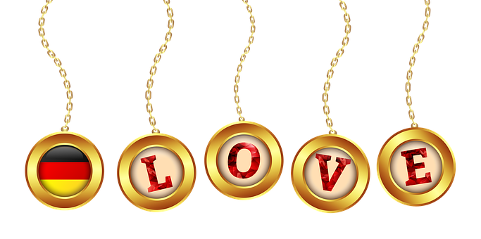 A Gold Circle With Red Letters On It PNG