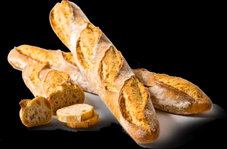A Group Of Baguettes And Slices Of Bread