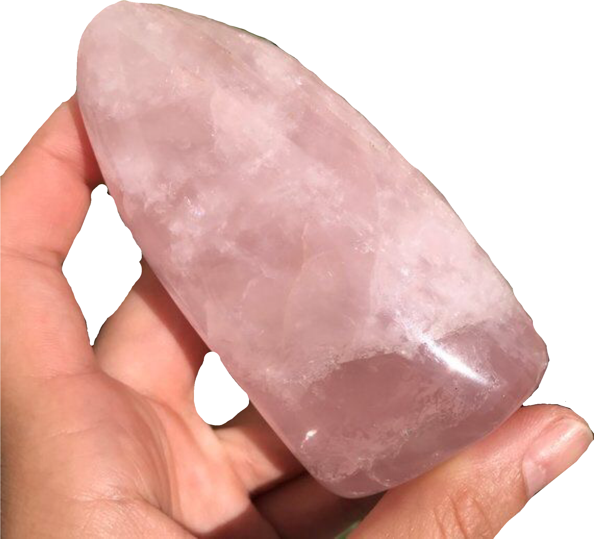 A Hand Holding A Pink Rock