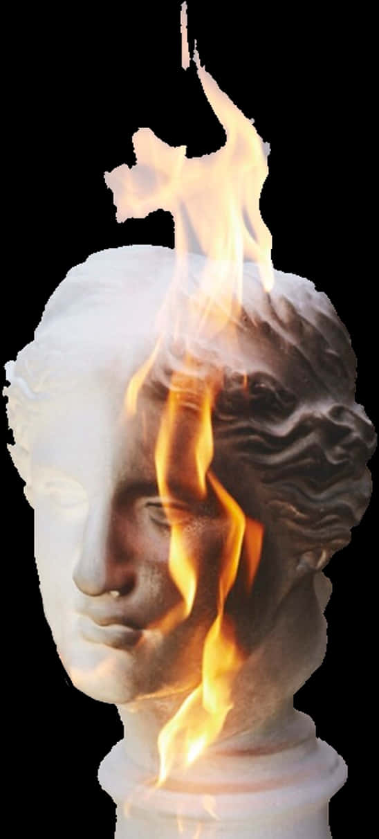 A Head Of A Statue With A Flame On It