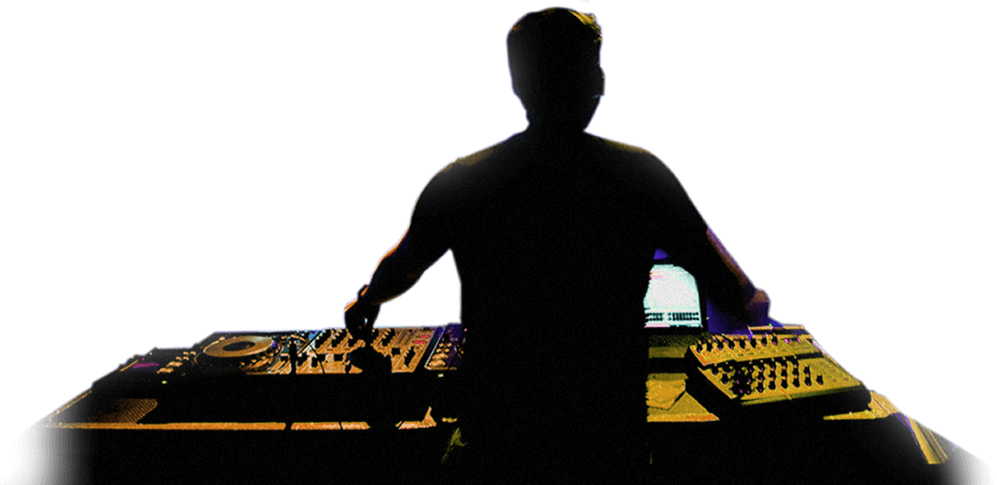 A Man Standing In Front Of A Mixer
