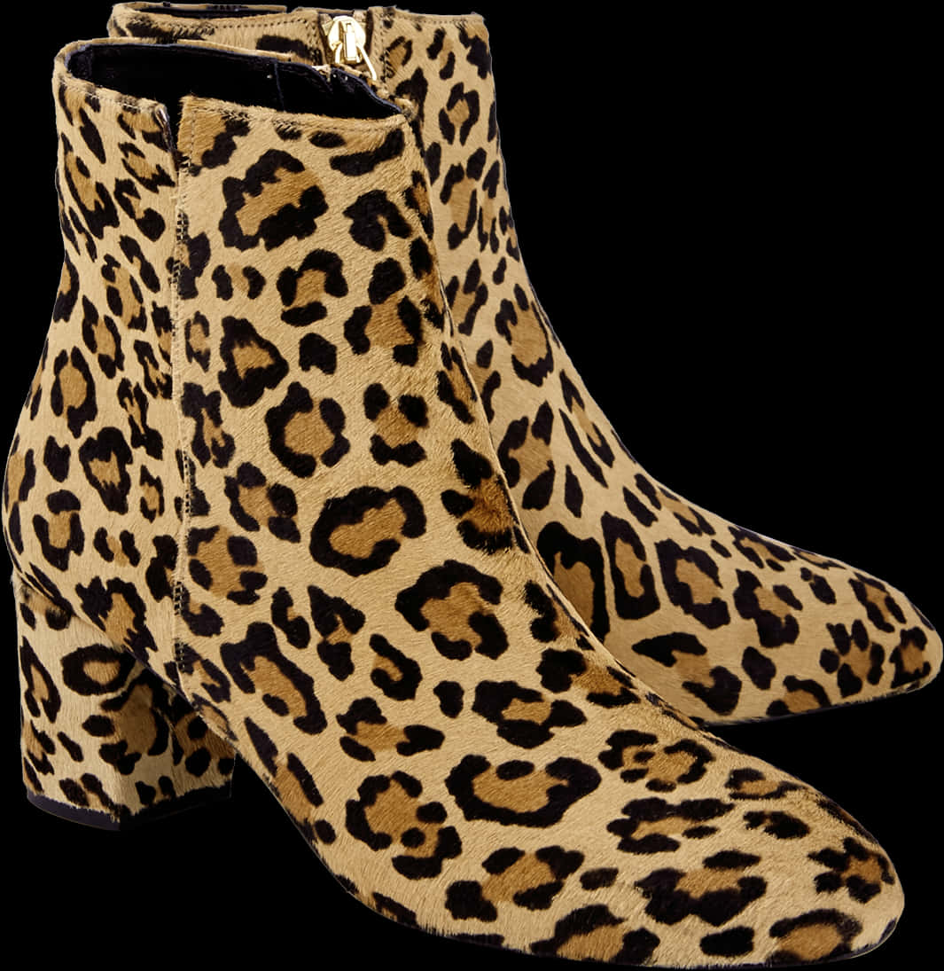 A Pair Of Leopard Print Boots PNG