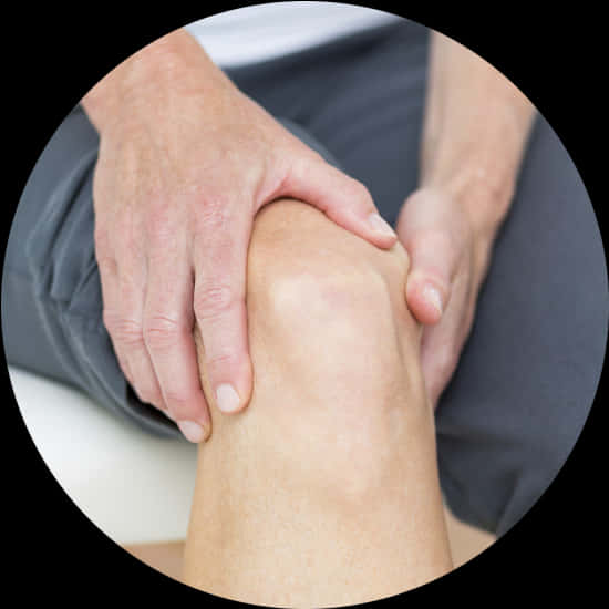 A Person Holding A Knee