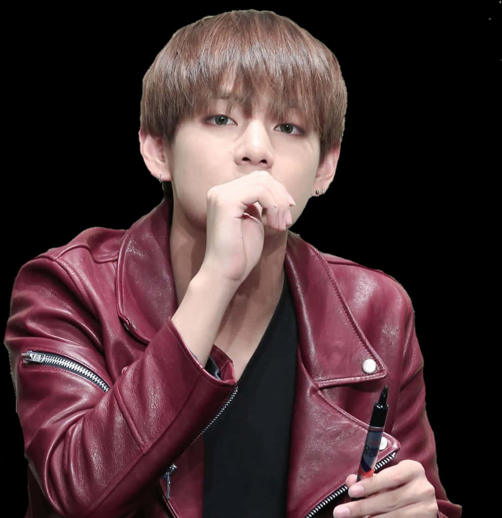 A Person In A Leather Jacket With A Pen In Their Mouth PNG