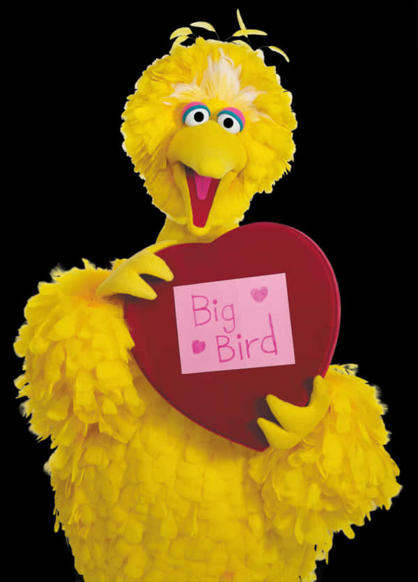 A Puppet Holding A Heart Shaped Box PNG
